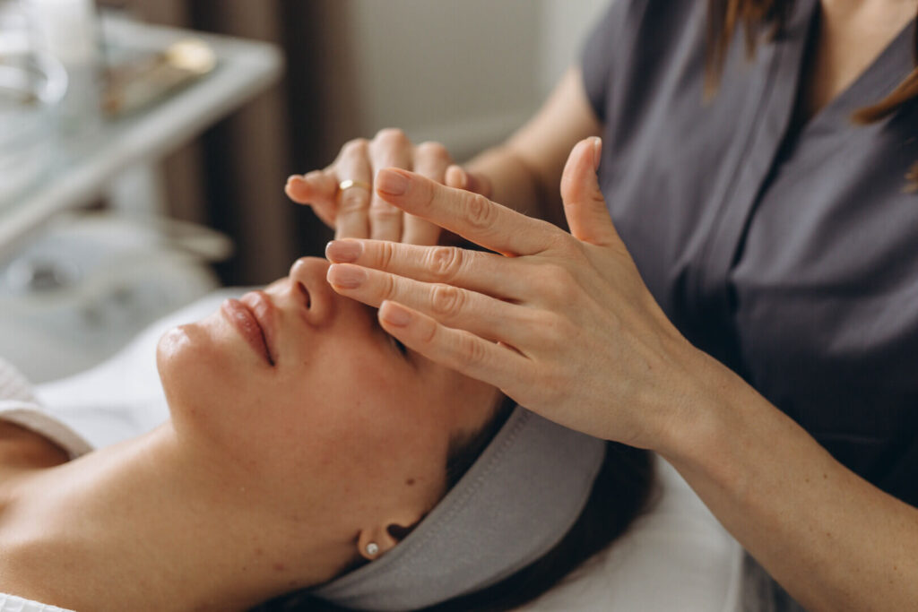 Forehead massage during facial treatment at Lalwa Aesthetics