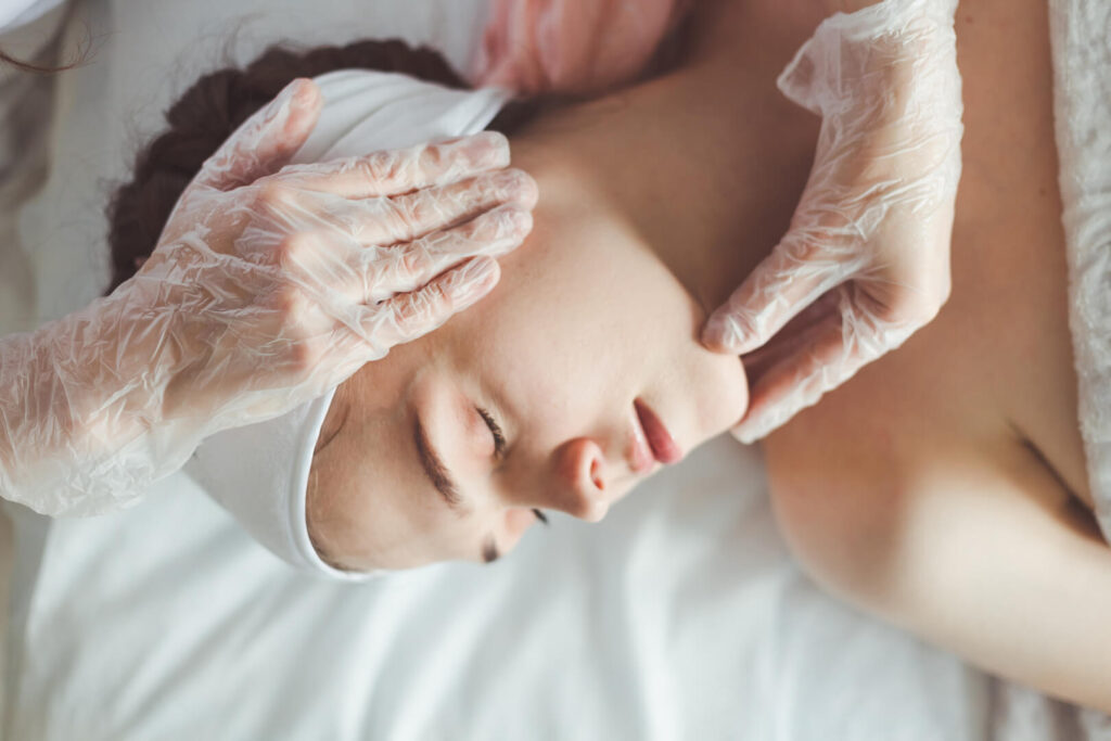 Relaxing facial massage by therapist at Lalwa Aesthetics clinic