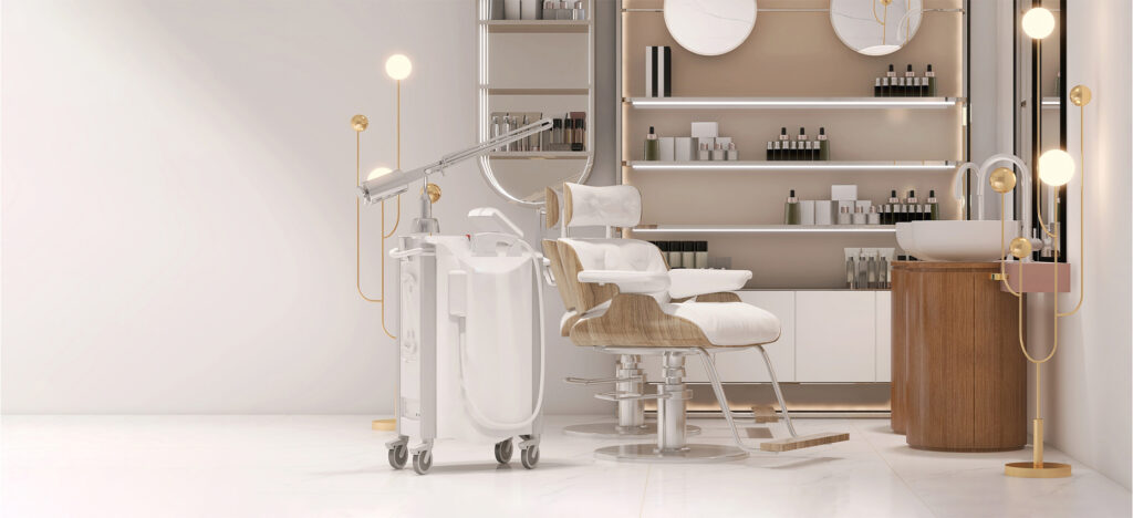 Modern aesthetic treatment room with reclining chair, skincare equipment and neatly arranged products on shelves